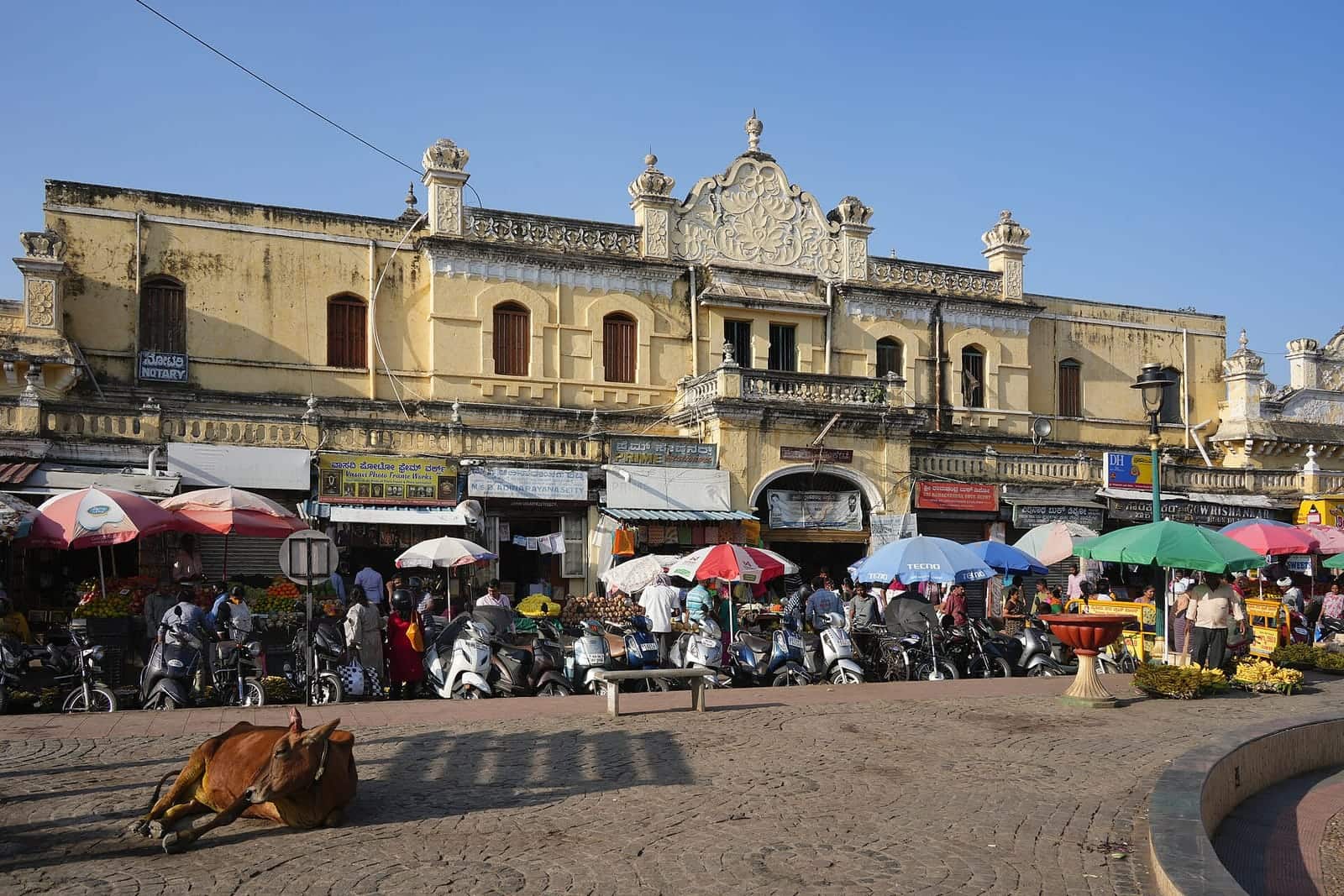 The entrance to Devaraja Market, busy with shoppers and stalls