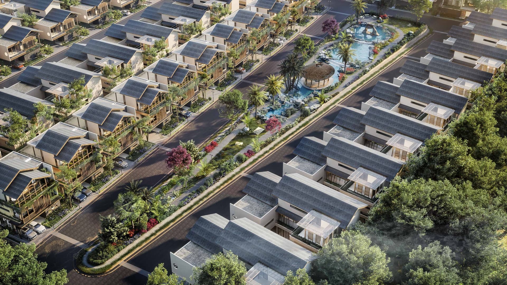Aerial view over villa rooflines and the central water garden at Ayana Woods