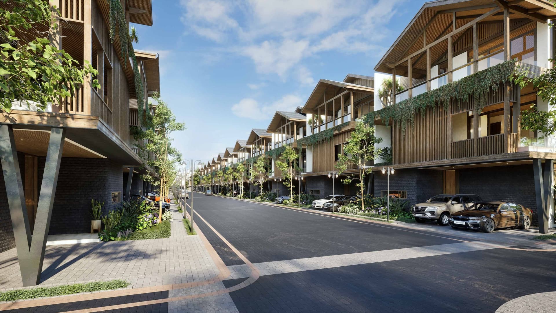 Tree-lined internal street at Ayana Woods flanked by timber villas