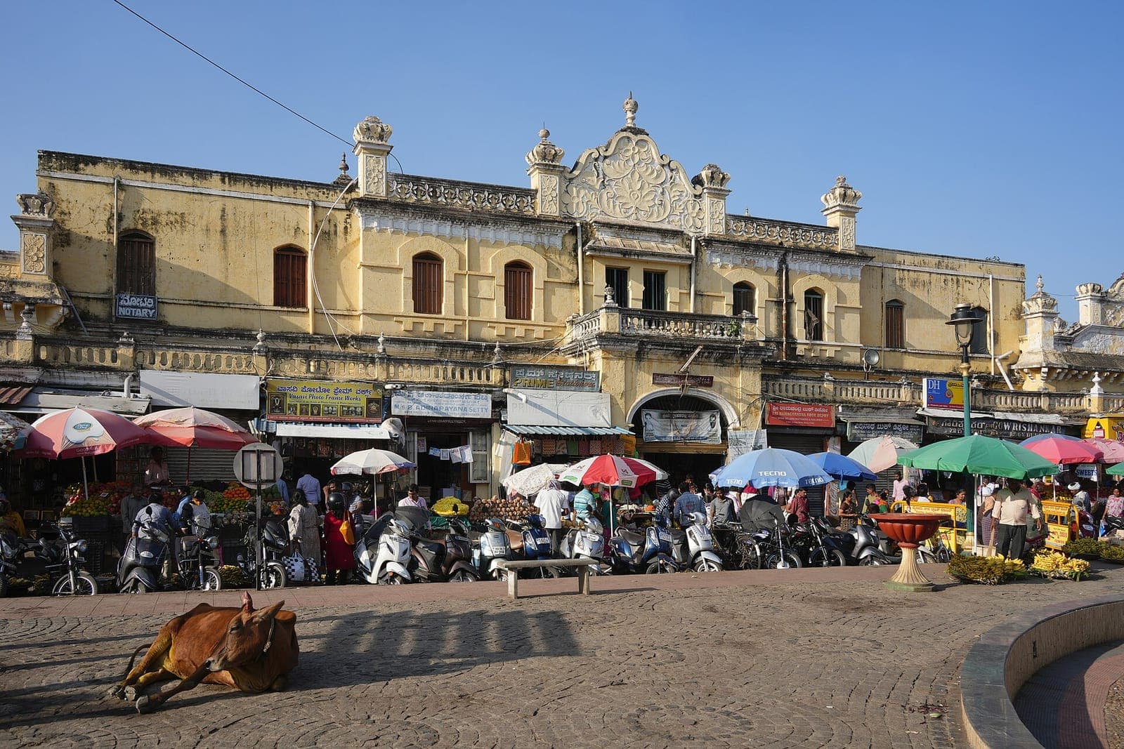 The entrance to Devaraja Market, busy with shoppers and stalls